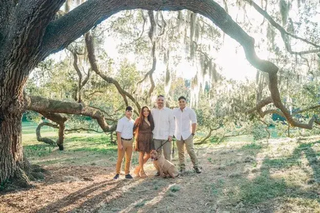 From left to right youngest son Matias, wife Addy, Rodrigo, eldest son Nicolas and family dog Zeus.