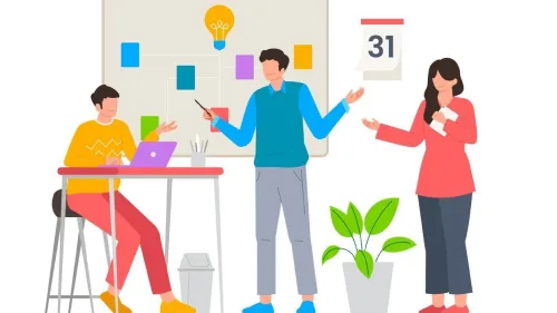 Three people talking to each other in an office environment with a white board in the background