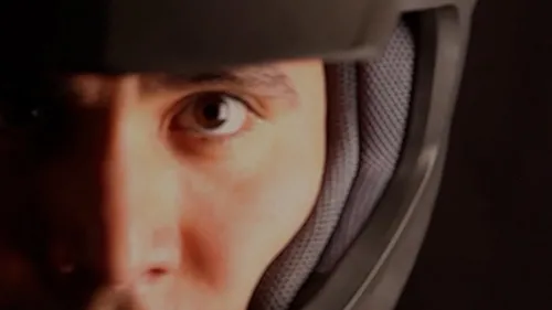 A man in a motorcycle helmet