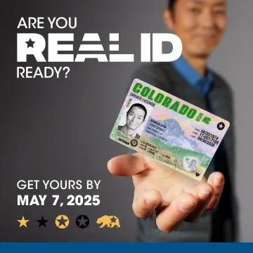 Are you REAL ID Ready? Get yours by May 7, 2025. Man holding a driver's license in hand.