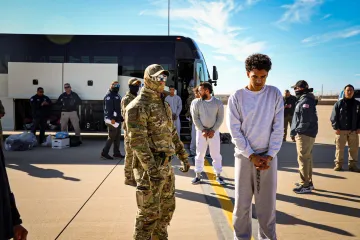 Caption: <p>DHS Releases Images of the First Flight of Criminal Aliens to Guantanamo Bay</p>