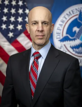 Caption: John Gountanis Official Portrait at DHS Headquarters (Photo by Mikaela McGee)