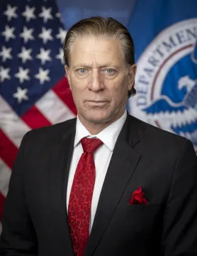 Caption: David Richardson Official Portrait (DHS photo by Tia Dufour)