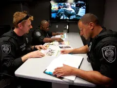 FPS officers review documents